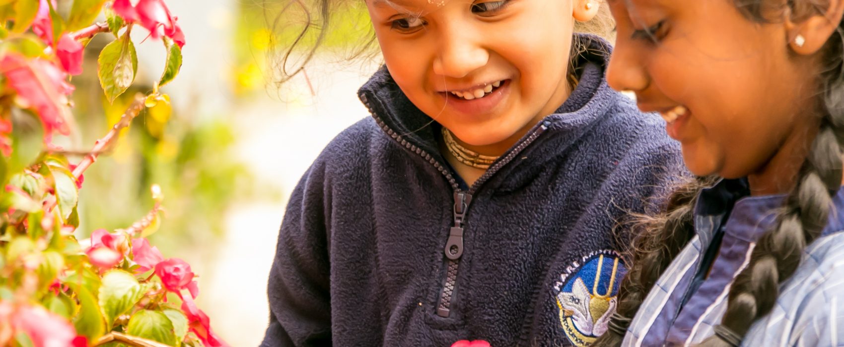 Students in the garden at Hare Krishna School